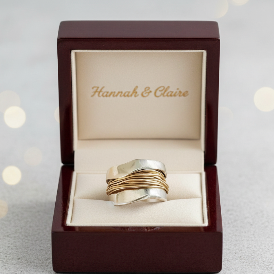 Silver ring with golden threads